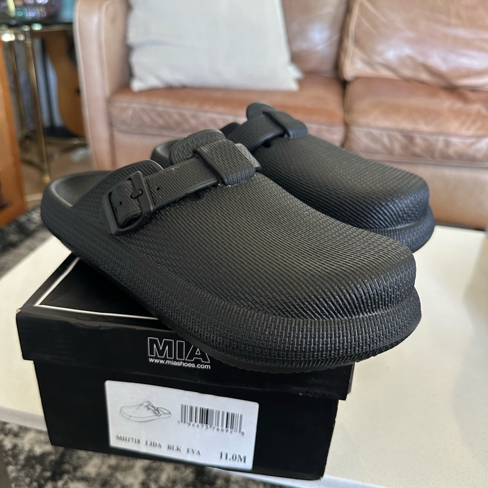Brand new slip on rubber shoes!